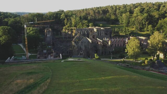 Abbey in 4k. Aerial photography. View from above. Top view of the abbey. Ruined abbey. Historical places. Destructive building. Abandoned. Belgium