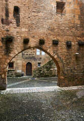 Medieval arched entrance in a stone wall