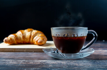 cup of coffee and croissant