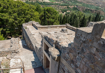 Knossos palace at Crete, Greece Knossos Palace, is the largest Bronze Age archaeological site on Crete and the ceremonial and political centre of the Minoan civilization and culture.