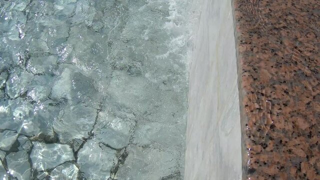 water flowing into the pool