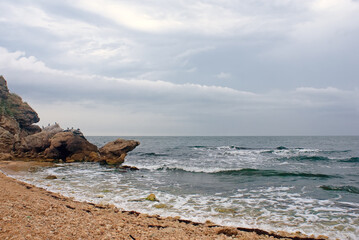 Fototapeta na wymiar The rock at the Azov seaside