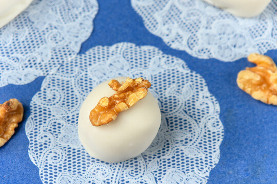 cameo decorated with walnut on a blue ceramic plate