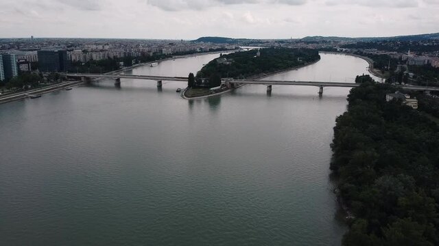 Aerial panning shot of Margaret island, Arpad bridge and district Buda and Pest in Hungary