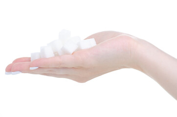 White sugar cubes in hand on white background isolation