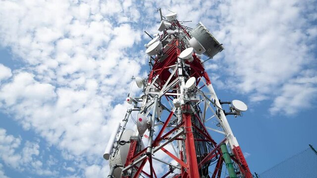 Time lapse footage of clouds passing radio tower