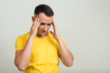 Portrait of handsome man with yellow shirt