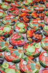 Fototapeta na wymiar Colorful metallic lids for jars