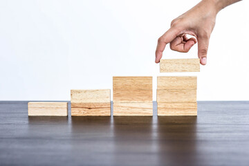 Wooden blocks and ideas for business growth To advance to the highest point