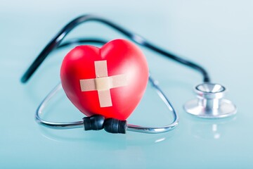 Stethoscope and Heart with Adhesive Bandage