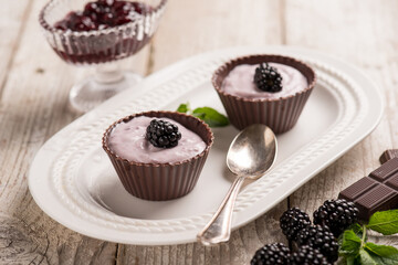homemade blackberry chocolates with meant leaf