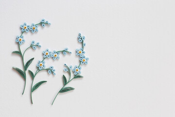 Beautiful blue flowers designs isolated on white background. Paper quilling,colorful paper flowers. Hand made of paper quilling technique