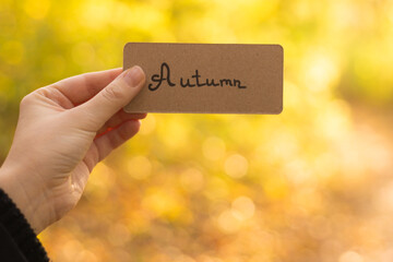 Autumn text on a card.