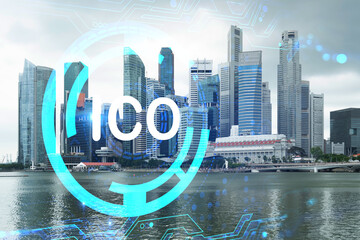 ICO icon hologram over panorama city view of Singapore, the hub of blockchain projects in Asia. The...
