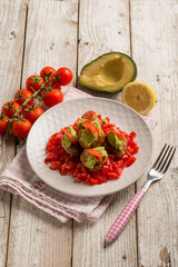 meatballs with fresh tomatoes salad and avocado cream