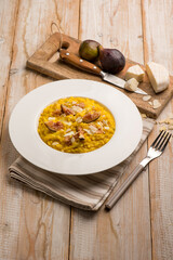 milanese risotto with cheese fig and sliced almond