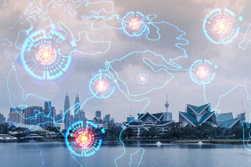 World planet Earth map hologram over panorama city view of Kuala Lumpur, Malaysia, Asia. The concept of international connections and business. Multi Exposure.