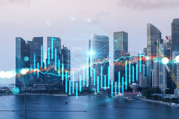 Forex and stock market chart hologram over panorama city view of Singapore, the financial center in Asia. The concept of international trading. Double exposure.