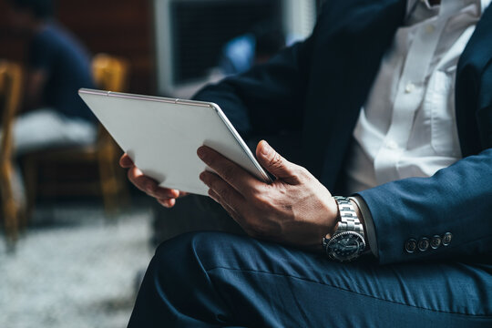 Business man hands holding tablet stock photo
