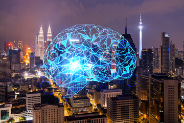 Human brain hologram, aerial panoramic city view of Kuala Lumpur at night. KL is the educational cluster in Malaysia, Asia. The concept of artificial intelligence. Double exposure.