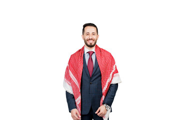 Handsome arabic businessman in suit and shemagh smiles on white blank background in studio. Business portrait of successful man