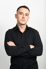 Portrait of handsome businessman against white background