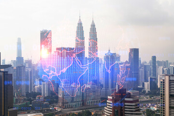 Fototapeta na wymiar World planet Earth map hologram over panorama city view of Kuala Lumpur, Malaysia, Asia. The concept of international connections and business. Multi Exposure.