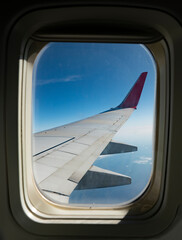 Airplane wing from the porthole window.