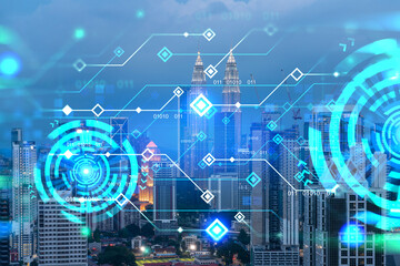 Fototapeta na wymiar Information flow hologram, night panorama city view of Kuala Lumpur. KL is the largest technological center in Malaysia, Asia. The concept of programming science. Double exposure.