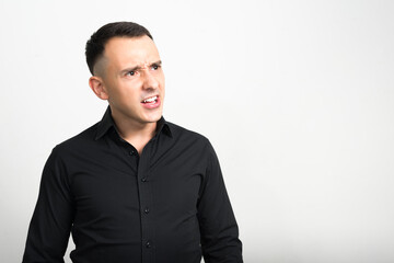 Portrait of handsome businessman against white background