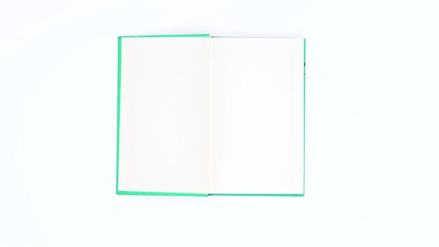 Green screen cover book appear and open. Stop motion 