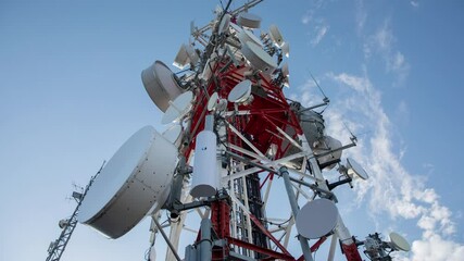Time lapse footage of clouds passing radio tower
