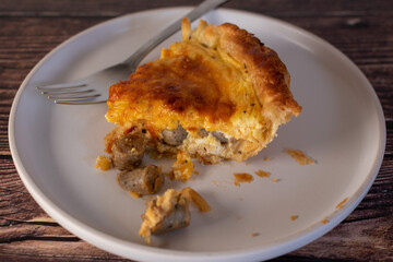 slice of home made sausage quiche 