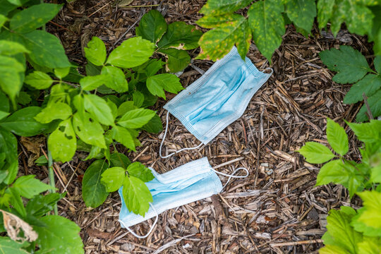 disposable masks as trash on the ground