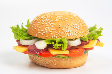 Hamburger with vegetables and sausage on a white background. Fast food and breakfast. Calories and diet.