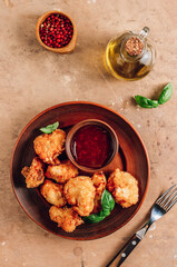 Popular Baked Cauliflower with barbeque sauce. Buffalo barbecue Cauliflower Wings. Vegan Food concept.