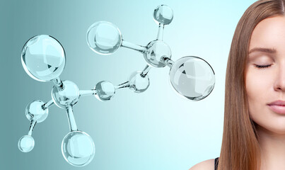 Glassy molecules structure near sensual woman. Over green-blue background. Beauty science concept.
