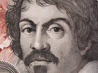 Caravaggio portrait on 100000 italian lire banknote closeup macro. One of the greatest and innovative painter of the Renaissance.
