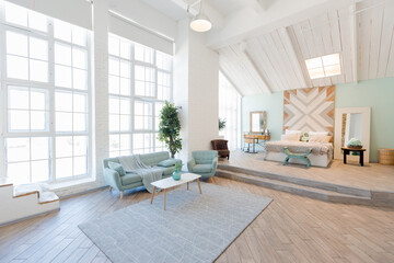 Fashionable spacious apartment with a stylish design in green, grey and white pastel colors with...