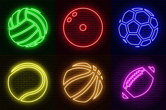 Neon sign against a brick wall. A set of different colored balls. To decorate sports bars, cafes, restaurants, pubs. Isolated.