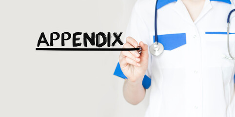 Doctor writing word APPENDIX with marker, Medical concept