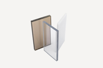 Solid Polycarbonate Sheet. Brown, white, transparent. Acrylic Plastic glass