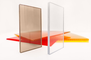 Solid Polycarbonate Sheet. Brown and transparent. Acrylic Plastic glass. Colored pc sheet on...