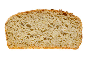 Slice of spelt bread, from above. Brown sourdough bread, a mix of spelt flour, leaven, sunflower seeds and spices, baked in oven. Staple food. Close-up, on white background, isolated macro food photo.