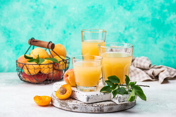 Apricot juice in glass. Healthy drink