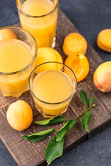 Apricot juice in glass. Healthy drink