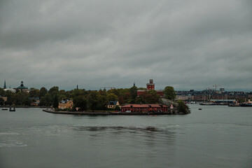 Naklejka premium Sweden. Stockholm. Stockholm coast early in the morning. Lights of the morning city. September 17, 2018