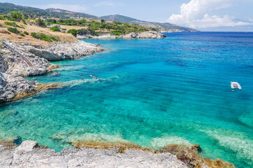 Scenic view on turquoise rocky beach situated on the north east coast of Zakynthos island, Greece.