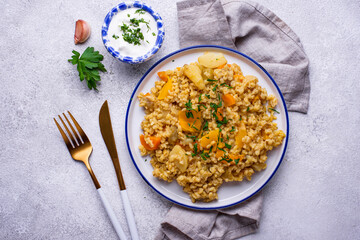 Stewed healthy bulgur with vegetables