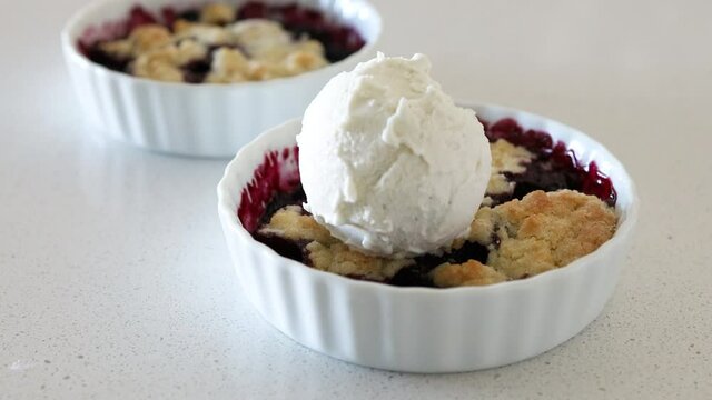Adding Vanilla Ice Cream to Blueberry Cobbler